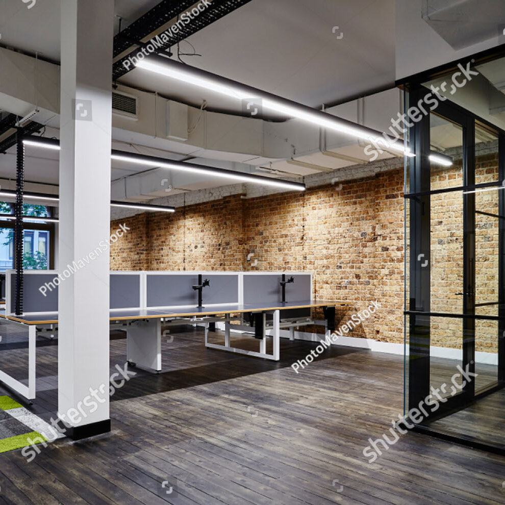 Stock Photo Interior Photography Of An Empty Open Plan Office In A Warehouse Conversion With Desks Exposed 1598165779